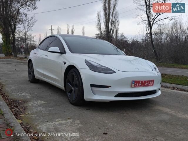 Білий Тесла Модель 3, об'ємом двигуна 0 л та пробігом 74 тис. км за 17900 $, фото 1 на Automoto.ua