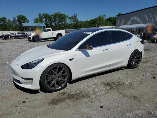 Белый Тесла Модель 3, объемом двигателя 0 л и пробегом 87 тыс. км за 12700 $, фото 1 на Automoto.ua
