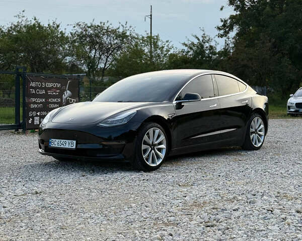 Черный Тесла Модель 3, объемом двигателя 0 л и пробегом 128 тыс. км за 16000 $, фото 1 на Automoto.ua