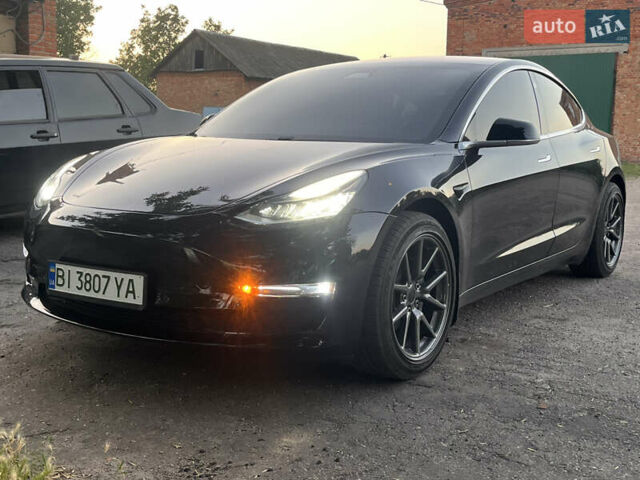 Чорний Тесла Модель 3, об'ємом двигуна 0 л та пробігом 157 тис. км за 18500 $, фото 1 на Automoto.ua