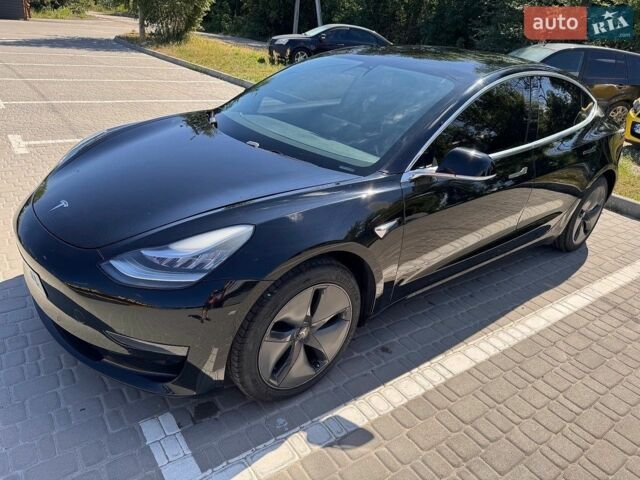 Чорний Тесла Модель 3, об'ємом двигуна 2.1 л та пробігом 79 тис. км за 10500 $, фото 1 на Automoto.ua