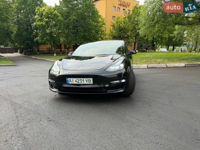 Черный Тесла Модель 3, объемом двигателя 0 л и пробегом 129 тыс. км за 19999 $, фото 1 на Automoto.ua