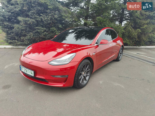 Красный Тесла Модель 3, объемом двигателя 0 л и пробегом 123 тыс. км за 16300 $, фото 1 на Automoto.ua