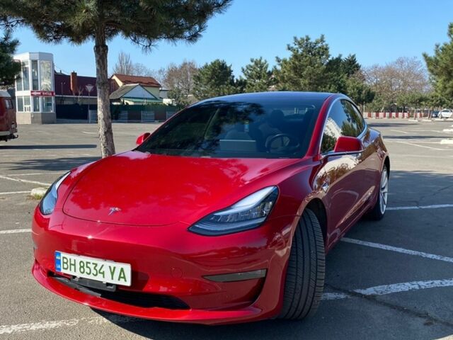 Красный Тесла Модель 3, объемом двигателя 0 л и пробегом 125 тыс. км за 17000 $, фото 1 на Automoto.ua