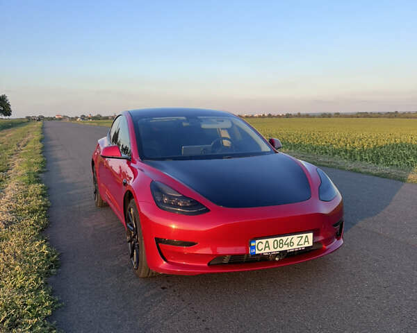 Красный Тесла Модель 3, объемом двигателя 0 л и пробегом 100 тыс. км за 17200 $, фото 1 на Automoto.ua