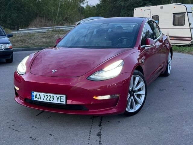 Красный Тесла Модель 3, объемом двигателя 0 л и пробегом 228 тыс. км за 15000 $, фото 1 на Automoto.ua