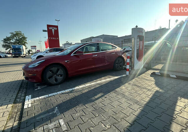 Красный Тесла Модель 3, объемом двигателя 0 л и пробегом 106 тыс. км за 18500 $, фото 1 на Automoto.ua