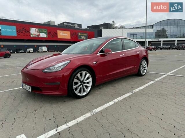 Красный Тесла Модель 3, объемом двигателя 0 л и пробегом 115 тыс. км за 15300 $, фото 1 на Automoto.ua