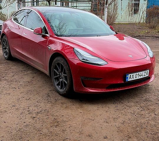 Красный Тесла Модель 3, объемом двигателя 0.26 л и пробегом 74 тыс. км за 17500 $, фото 1 на Automoto.ua