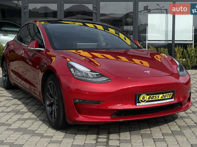 Красный Тесла Модель 3, объемом двигателя 0 л и пробегом 133 тыс. км за 15990 $, фото 1 на Automoto.ua