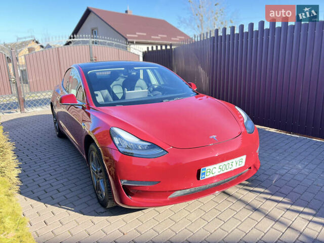 Красный Тесла Модель 3, объемом двигателя 0 л и пробегом 82 тыс. км за 15500 $, фото 1 на Automoto.ua