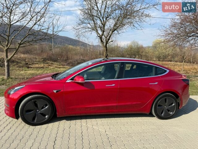 Красный Тесла Модель 3, объемом двигателя 0 л и пробегом 199 тыс. км за 17000 $, фото 1 на Automoto.ua