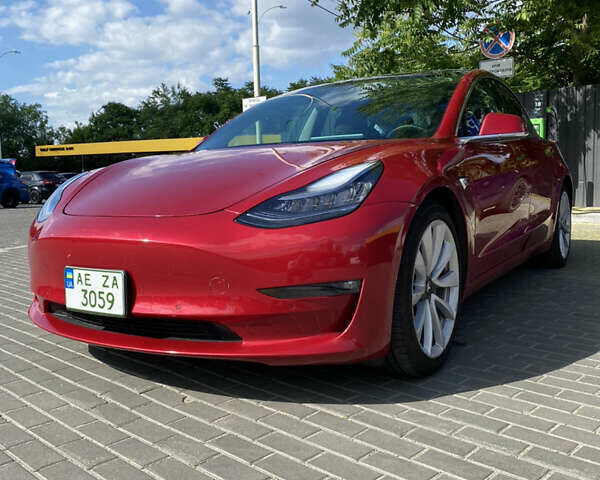 Красный Тесла Модель 3, объемом двигателя 0 л и пробегом 73 тыс. км за 18990 $, фото 1 на Automoto.ua