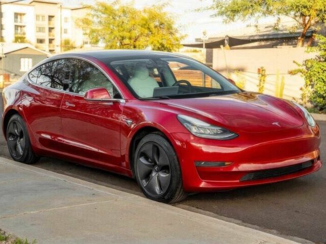 Красный Тесла Модель 3, объемом двигателя 0 л и пробегом 35 тыс. км за 8000 $, фото 1 на Automoto.ua