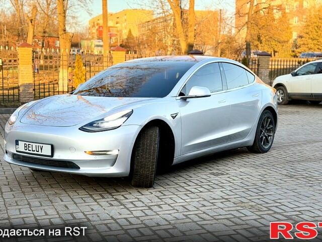 Серый Тесла Модель 3, объемом двигателя 0.19 л и пробегом 193 тыс. км за 16500 $, фото 1 на Automoto.ua