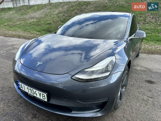 Серый Тесла Модель 3, объемом двигателя 0 л и пробегом 130 тыс. км за 15200 $, фото 1 на Automoto.ua