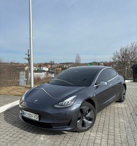Серый Тесла Модель 3, объемом двигателя 0 л и пробегом 65 тыс. км за 16000 $, фото 1 на Automoto.ua