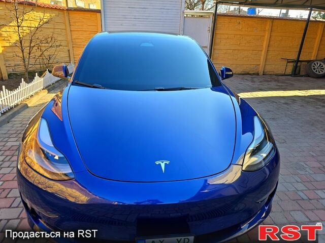 Синий Тесла Модель 3, объемом двигателя 0.18 л и пробегом 125 тыс. км за 18000 $, фото 1 на Automoto.ua