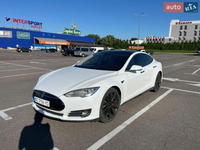 Белый Тесла Модель С, объемом двигателя 0 л и пробегом 144 тыс. км за 11000 $, фото 1 на Automoto.ua