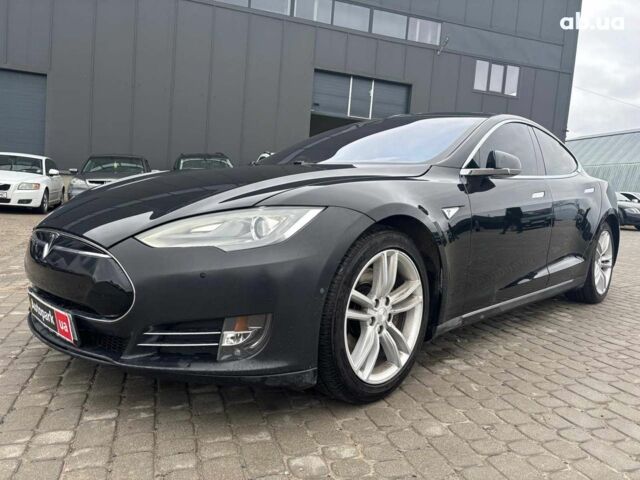 Черный Тесла Модель С, объемом двигателя 1 л и пробегом 143 тыс. км за 14690 $, фото 1 на Automoto.ua