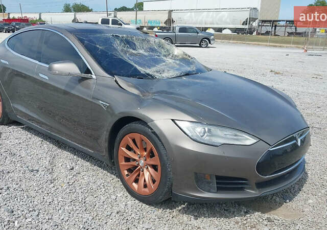 Коричневый Тесла Модель С, объемом двигателя 0 л и пробегом 199 тыс. км за 9999 $, фото 1 на Automoto.ua