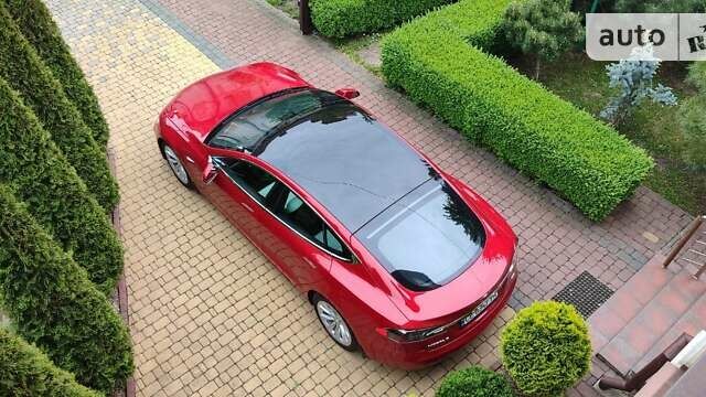 Красный Тесла Модель С, объемом двигателя 0 л и пробегом 81 тыс. км за 33000 $, фото 1 на Automoto.ua
