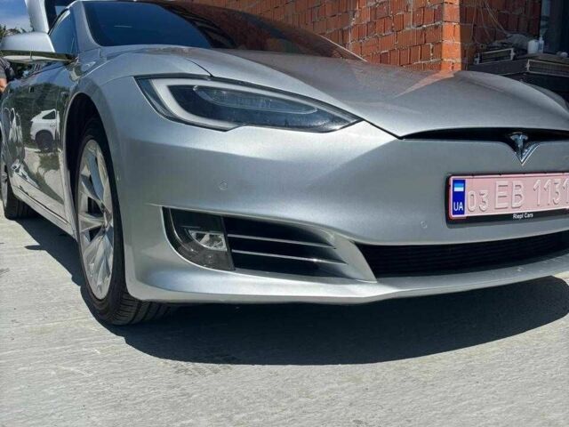 Серый Тесла Модель С, объемом двигателя 0 л и пробегом 65 тыс. км за 23500 $, фото 1 на Automoto.ua