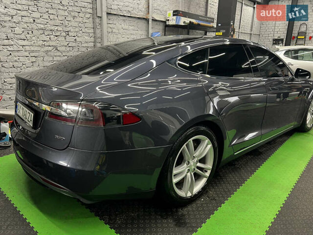 Серый Тесла Модель С, объемом двигателя 0 л и пробегом 246 тыс. км за 18500 $, фото 1 на Automoto.ua