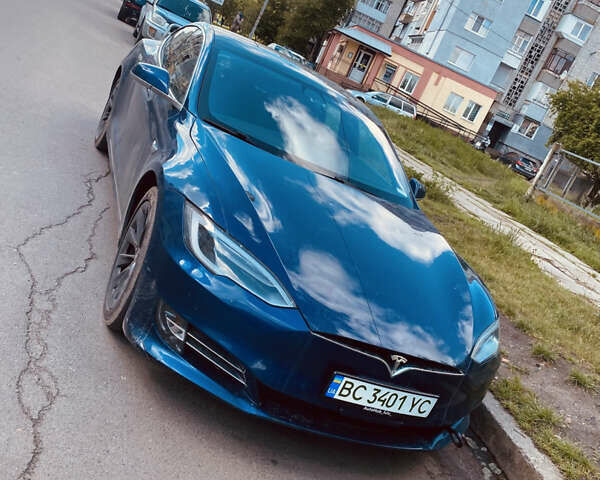Синий Тесла Модель С, объемом двигателя 0 л и пробегом 105 тыс. км за 26000 $, фото 1 на Automoto.ua