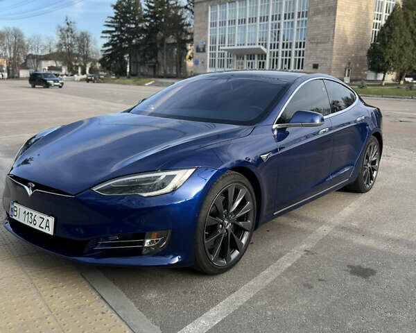 Синий Тесла Модель С, объемом двигателя 0 л и пробегом 100 тыс. км за 29000 $, фото 1 на Automoto.ua