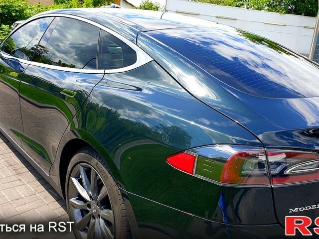 Зеленый Тесла Модель С, объемом двигателя 0 л и пробегом 244 тыс. км за 12700 $, фото 1 на Automoto.ua