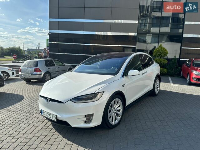 Белый Тесла Модель Х, объемом двигателя 0 л и пробегом 125 тыс. км за 24700 $, фото 1 на Automoto.ua
