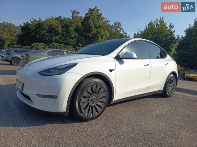 Белый Тесла Model Y, объемом двигателя 0 л и пробегом 61 тыс. км за 25000 $, фото 1 на Automoto.ua