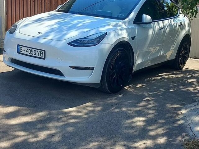 Білий Тесла Model Y, об'ємом двигуна 0 л та пробігом 50 тис. км за 24900 $, фото 1 на Automoto.ua