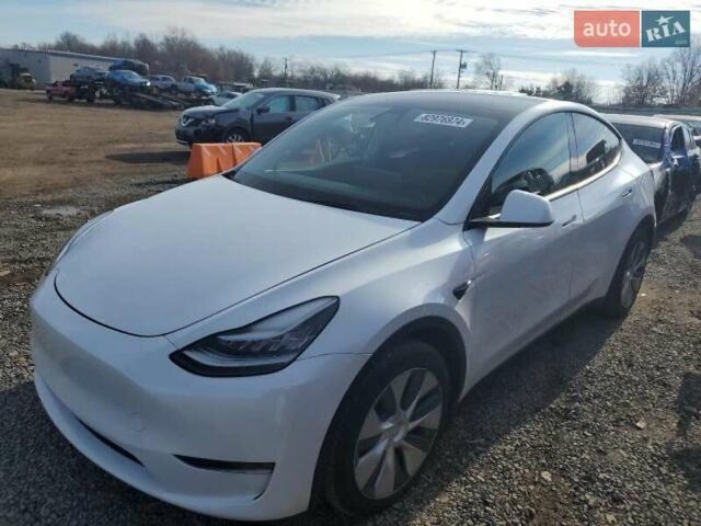 Белый Тесла Model Y, объемом двигателя 0 л и пробегом 61 тыс. км за 9450 $, фото 1 на Automoto.ua