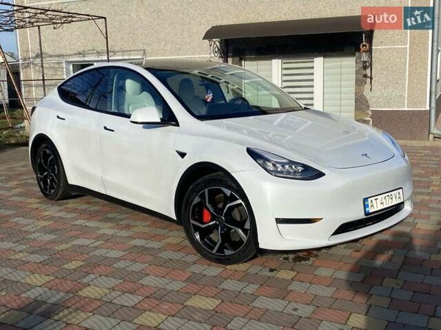 Белый Тесла Model Y, объемом двигателя 0 л и пробегом 113 тыс. км за 24700 $, фото 1 на Automoto.ua