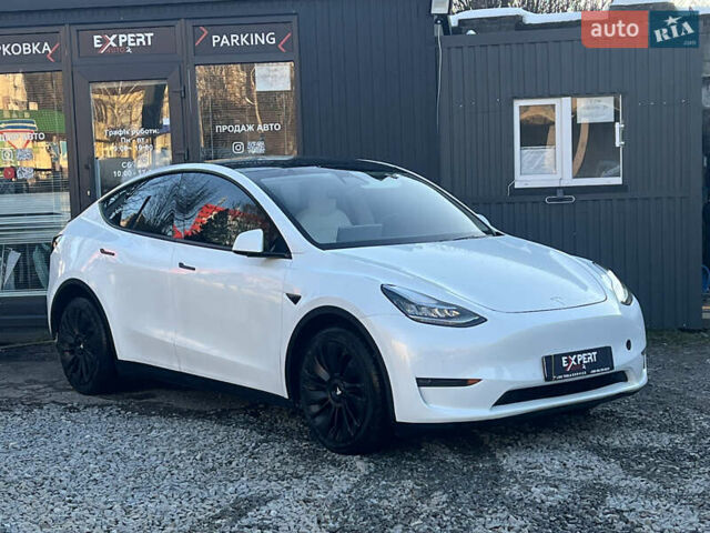 Белый Тесла Model Y, объемом двигателя 0 л и пробегом 55 тыс. км за 23490 $, фото 1 на Automoto.ua