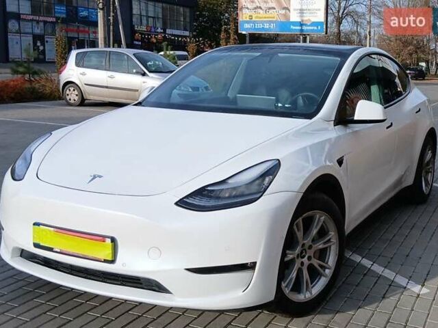 Белый Тесла Model Y, объемом двигателя 0 л и пробегом 69 тыс. км за 23300 $, фото 1 на Automoto.ua