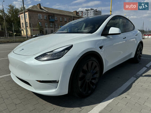 Белый Тесла Model Y, объемом двигателя 0 л и пробегом 97 тыс. км за 23899 $, фото 1 на Automoto.ua