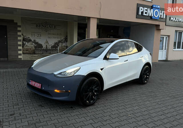 Білий Тесла Model Y, об'ємом двигуна 0 л та пробігом 187 тис. км за 18900 $, фото 1 на Automoto.ua
