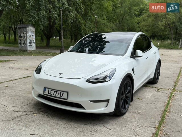 Белый Тесла Model Y, объемом двигателя 0 л и пробегом 86 тыс. км за 27000 $, фото 1 на Automoto.ua