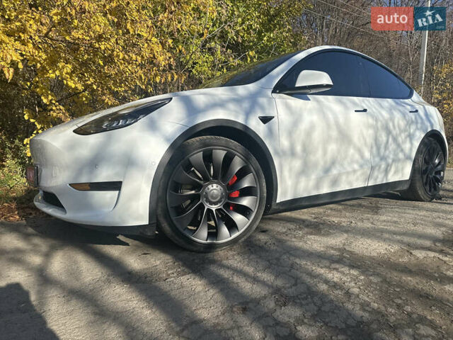 Белый Тесла Model Y, объемом двигателя 0 л и пробегом 71 тыс. км за 23400 $, фото 1 на Automoto.ua
