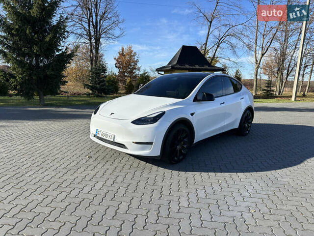 Белый Тесла Model Y, объемом двигателя 0 л и пробегом 85 тыс. км за 22900 $, фото 1 на Automoto.ua