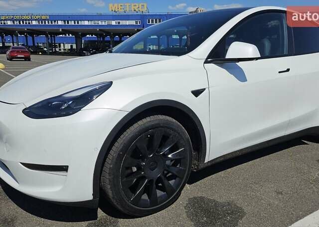 Белый Тесла Model Y, объемом двигателя 0 л и пробегом 110 тыс. км за 20499 $, фото 1 на Automoto.ua