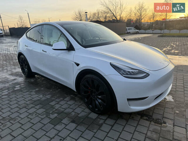Белый Тесла Model Y, объемом двигателя 0 л и пробегом 65 тыс. км за 19600 $, фото 1 на Automoto.ua