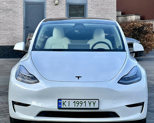 Белый Тесла Model Y, объемом двигателя 0 л и пробегом 57 тыс. км за 28500 $, фото 1 на Automoto.ua