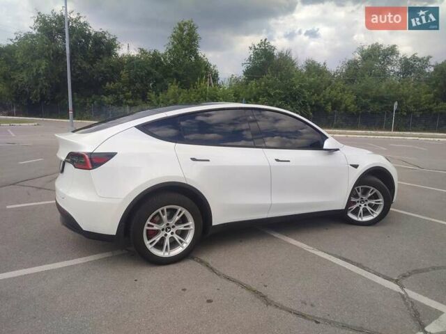 Белый Тесла Model Y, объемом двигателя 0 л и пробегом 40 тыс. км за 38999 $, фото 1 на Automoto.ua