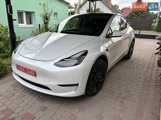 Белый Тесла Model Y, объемом двигателя 0 л и пробегом 107 тыс. км за 22000 $, фото 1 на Automoto.ua