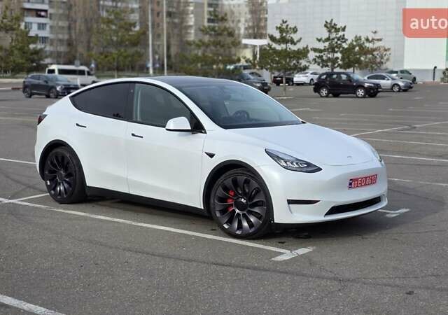 Белый Тесла Model Y, объемом двигателя 0 л и пробегом 54 тыс. км за 23999 $, фото 1 на Automoto.ua