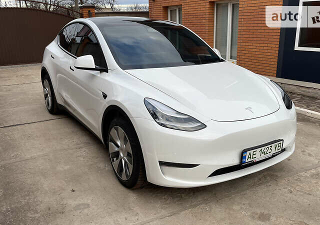 Білий Тесла Model Y, об'ємом двигуна 0 л та пробігом 54 тис. км за 28000 $, фото 1 на Automoto.ua